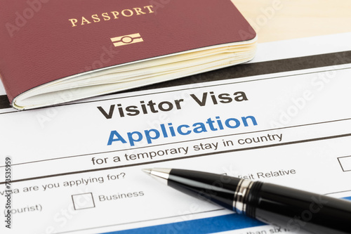 Fotografie, Obraz Visa application form with passport and pen