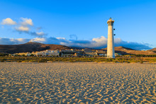 Lighthouse On Morro Jable Beach At Sunset, Fuerteventura Island
