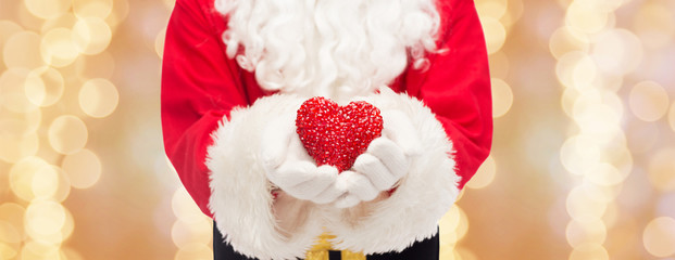 Wall Mural - close up of santa claus with heart shape