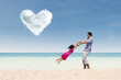 © Creativa Images - Happy time with dad under heart cloud