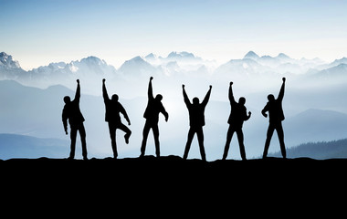 Wall Mural - team on mountain top. active life concept
