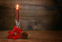 Candle With Poinsettia Flower