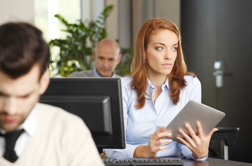 Sales woman with digital tablet