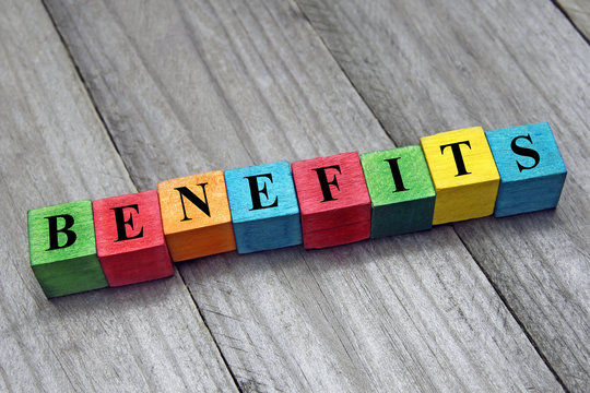 concept of benefits word on wooden colorful cubes