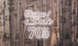© Thomas R. - wooden Christmas discount 70 percent off symbol with presents