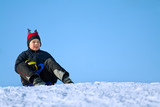 Fototapeta Panele - Little child playing in snow