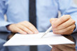© Bacho Foto - businessman in office is analyzing document