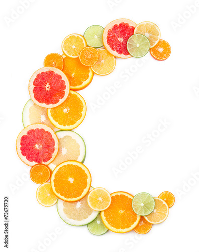 Fotografia Vitamin C concept (letter C made of citrus slices)