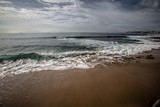 Fototapeta Morze - Soft wave of the sea on the sandy beach