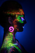 © chettythomas - Sensual woman in fluorescent paint makeup