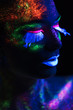© chettythomas - Sensual woman in fluorescent paint makeup. Close up