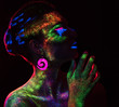 © chettythomas - Red  light contour on the sensual woman with fluorescent paint