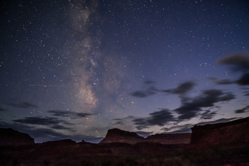 Bright Starry night with a Milky Way over the canyon