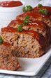 © FomaA - sliced meat loaf with ketchup and parsley close-up