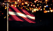 Latvia National Flag City Light Night Bokeh Background 3D