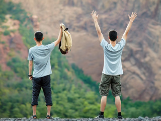 Wall Mural - Two happy men enjoying nature