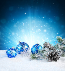 Wall Mural - magic of christmas - blue balls on snow.