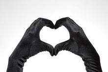 Black Heart Shaped Gloves Isolated On White Background