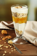 Canvas Print - Tasty dessert with oat flakes and honey, on table