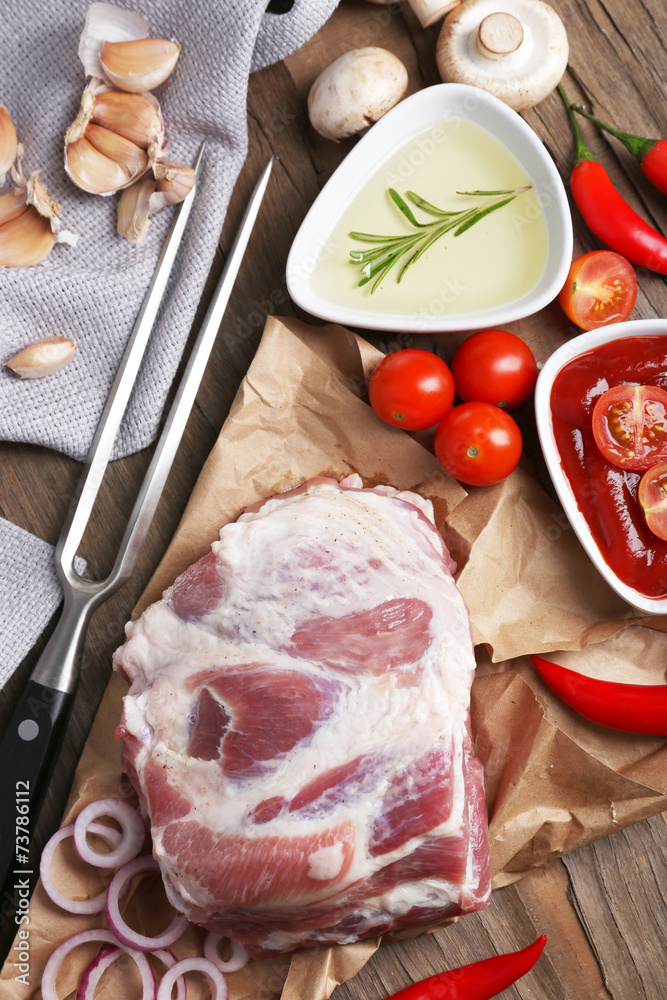 Raw meat on wooden table, close-up