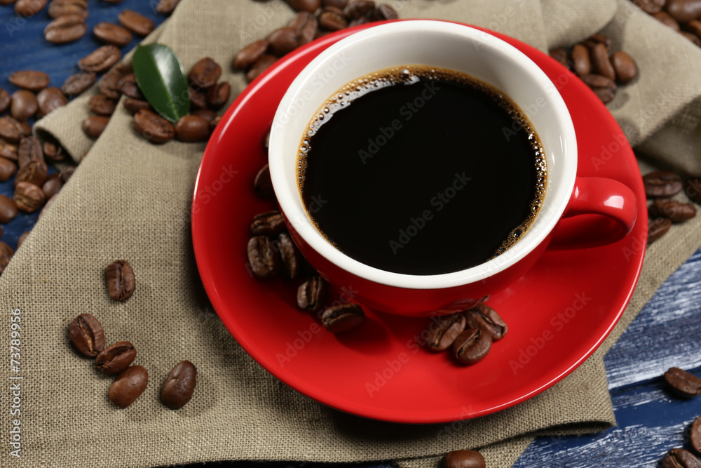 Cup of coffee on wooden table