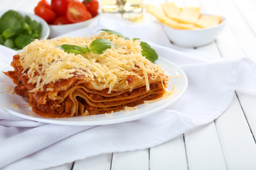 Poster - Portion of tasty lasagna on table