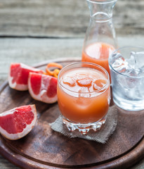 Wall Mural - Grapefruit fresh on the wooden table