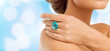 © Syda Productions - closeup of woman hand with big blue cocktail ring