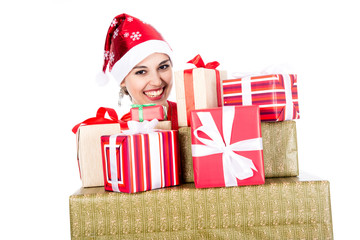 Beautiful christmas woman is holding gift in studio