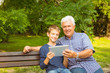 © Stock Rocket - Grandfather and grandson in the park