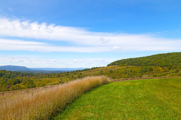 Green meadows and hills of countryside