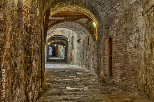 Nowoczesny obraz na płótnie covered alley in Colle di Val d'Elsa, Tuscany, Italy