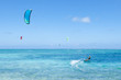 Kite surfer on clear blue tropical water, Okinawa, Japan