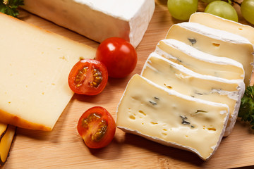 Wall Mural - Cheese on cutting board