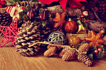 Wall Mural - christmas ornaments on a rustic wooden surface