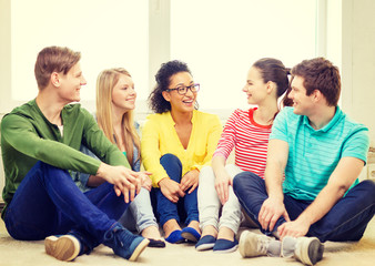 Sticker - five smiling teenagers having fun at home