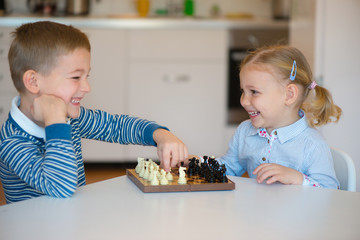 Wall Mural - Cute children playing at home