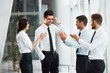 © puhhha - Teamwork. Successful Business People Celebrating a Deal