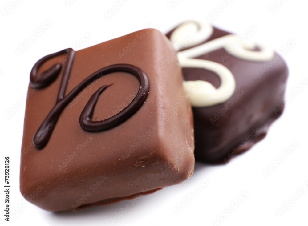 Delicious chocolate candy isolated on white