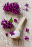 Fototapeta  - Spa composition with sea salt bath and lilac flowers