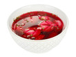 Traditional polish clear red borscht with dumplings isolated