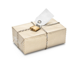 Locked and wrapped gift in gold striped paper.