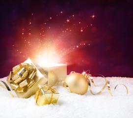 Wall Mural - magic shining of christmas present on snow