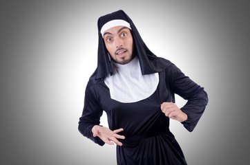 Male nun in funny religious concept