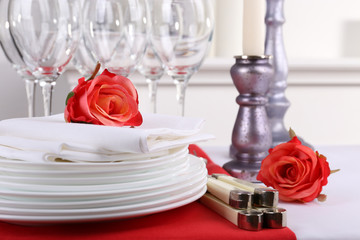 Festive table setting on room background