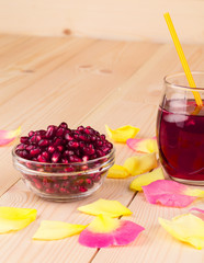 Wall Mural - Opened pomegranate seeds and juice.