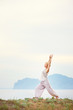 © luengo_ua - Senior woman doing yoga exercises