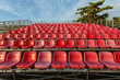 © SKT Studio - Empty plastic chairs at temporary grandstand stadium in Phuket,
