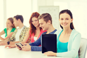 Wall Mural - smiling students with tablet pc at school