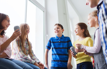 Poster - group of school kids with soda cans in corridor